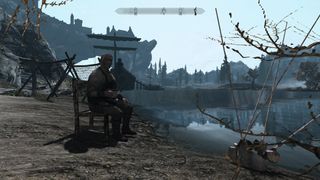 Best Skyrim mods — a Nord sits at riverside with their poles close at hand, prepared to engage in the unparalleled high of video game fishing.