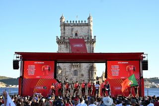 LISBON PORTUGAL AUGUST 15 Thymen Arensman of The Netherlands Kim Heiduk of Germany Jhonatan Narvaez of Ecuador Brandon Smith Rivera of Colombia Oscar Rodriguez of Spain Laurens De Plus of Belgium Joshua Tarling of The United Kingdom Carlos Rodriguez of Spain and Team INEOS Grenadiers during the team presentation at the Torre de Belem prior to the 79th La Vuelta Ciclista a Espana 2024 UCIWT on August 15 2024 in Lisbon Portugal Photo by Tim de WaeleGetty Images