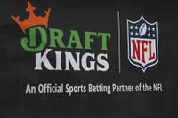 CHICAGO, ILLINOIS - APRIL 28: A DraftKings Sportsbook, the official sports betting partner of the NFL, advertisement on April 28, 2025 in Chicago, Illinois. (Photo by Aaron M. Sprecher/Getty Images)
