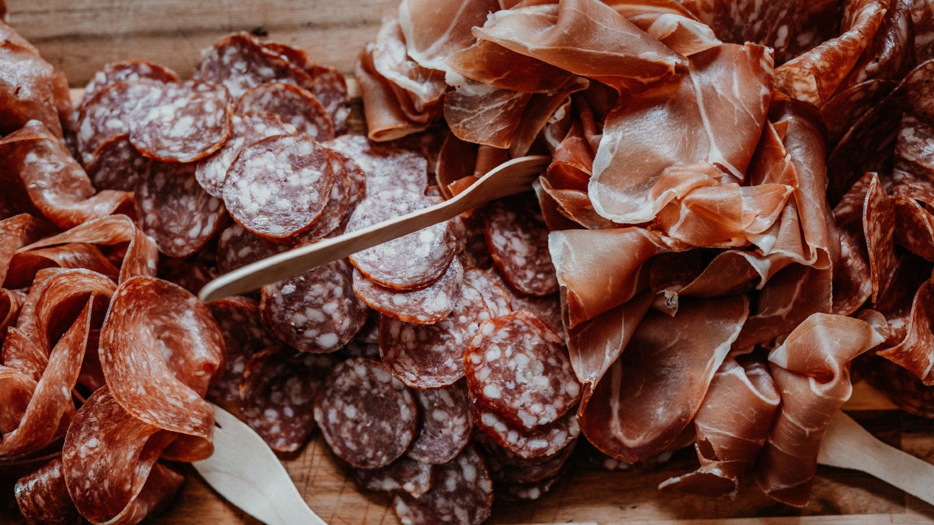 deli meats arranged on a platter