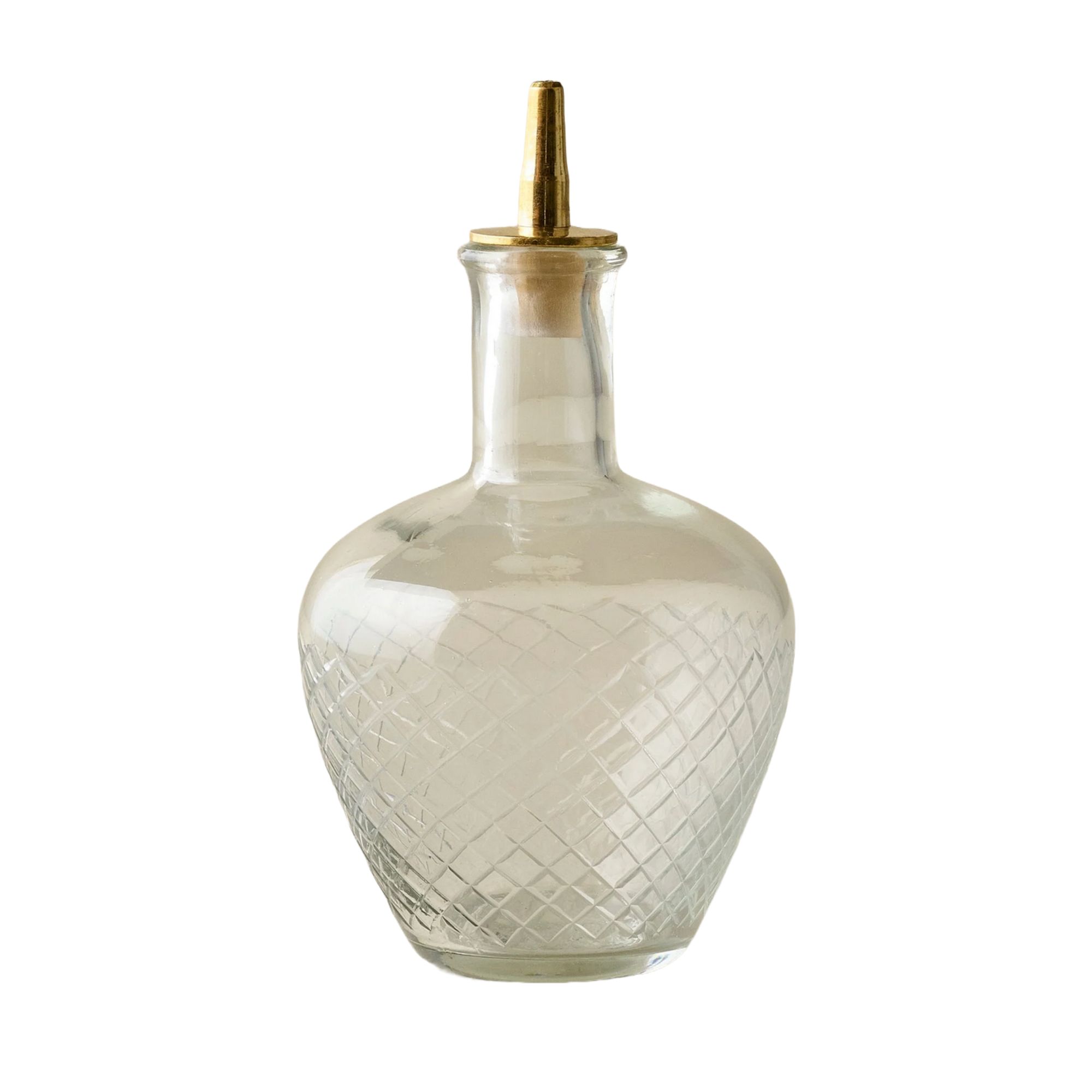 Etched glass vintage bottle with brass pouring spout