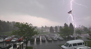 Lightning strikes near the AccuWeather, Inc., Global Headquarters building in State College, Pennsylvania, on May 27, 2014.