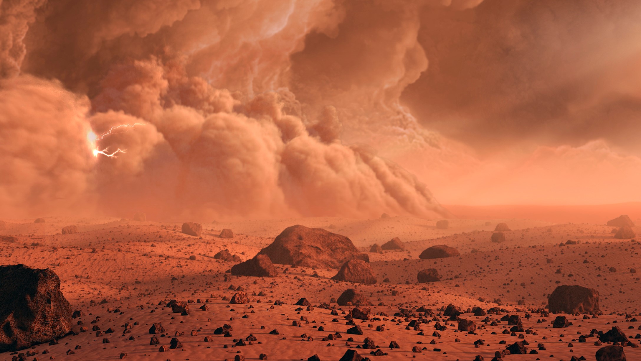 Large billowing clouds of dust sweep across a barran rusty red landscape.