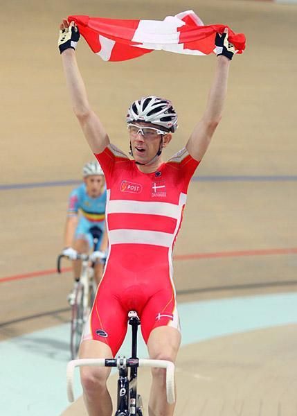 Denmark's Michael M&oslash;rk&oslash;v celebrates winning the madison at the 2009 track world championships.