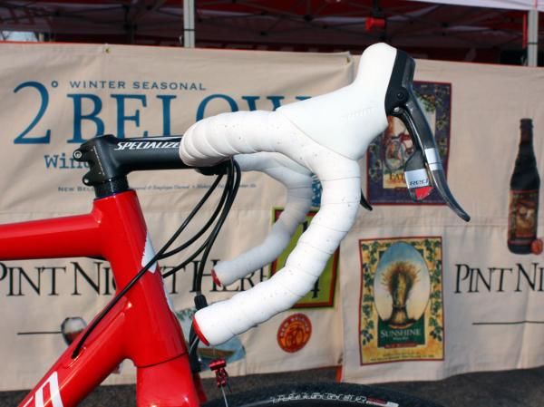 SRAM Red levers are tilted high on the carbon Specialized S-Works anatomic bar.