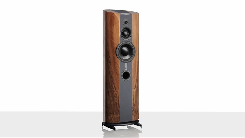 ATC EL50 Anniversary floorstanding speakers in walnut on a white background