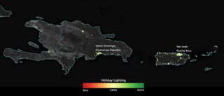 Image, created using data from the NOAA-NASA Suomi NPP satellite, showing how lights across Puerto Rico, Haiti and the Dominican Republic shine more brightly in December than they do during the rest of the year.