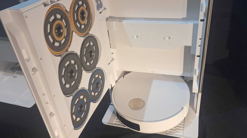 Photo showing the Dreame Matrix10 Ultra&#039;s dock with the door open, revealing three sets of different mop pads