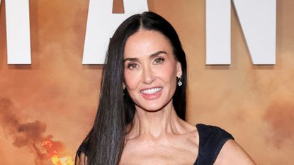 Demi Moore wearing GAP denim midi dress at Landman Season 2 screening on October 30, 2025 in Los Angeles, California