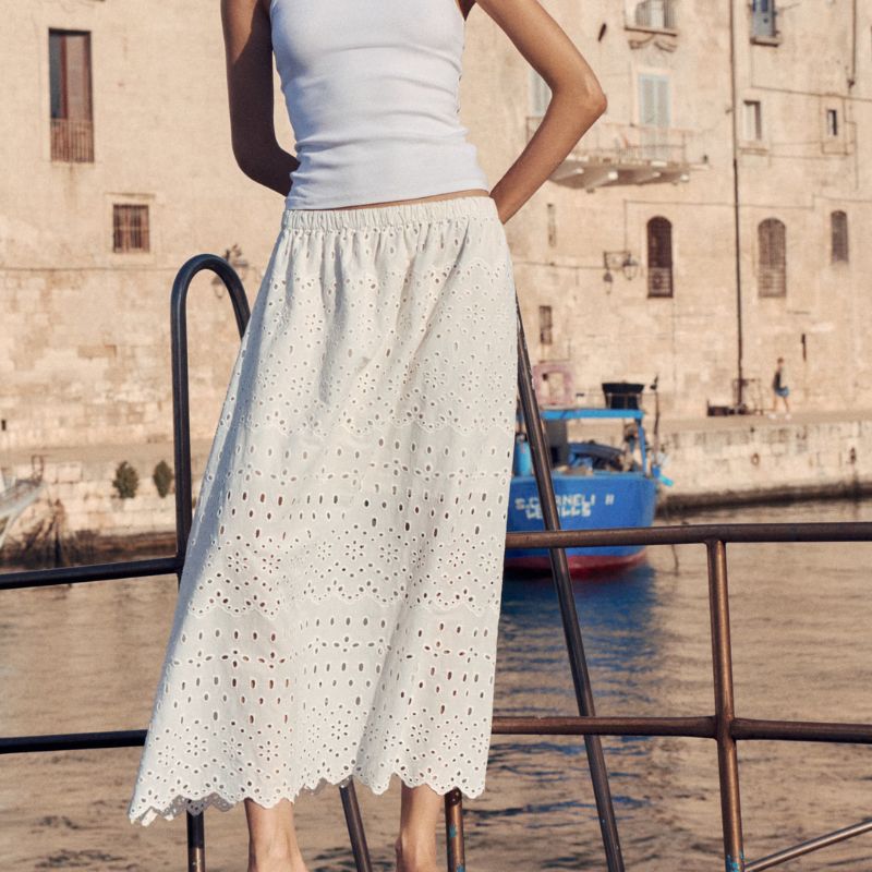 Broderie anglaise skirt on model 