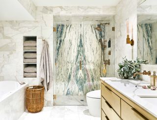 Master bathroom with walk in shower and green marble wall