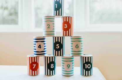 A stack of cans with the numbers one through 10.