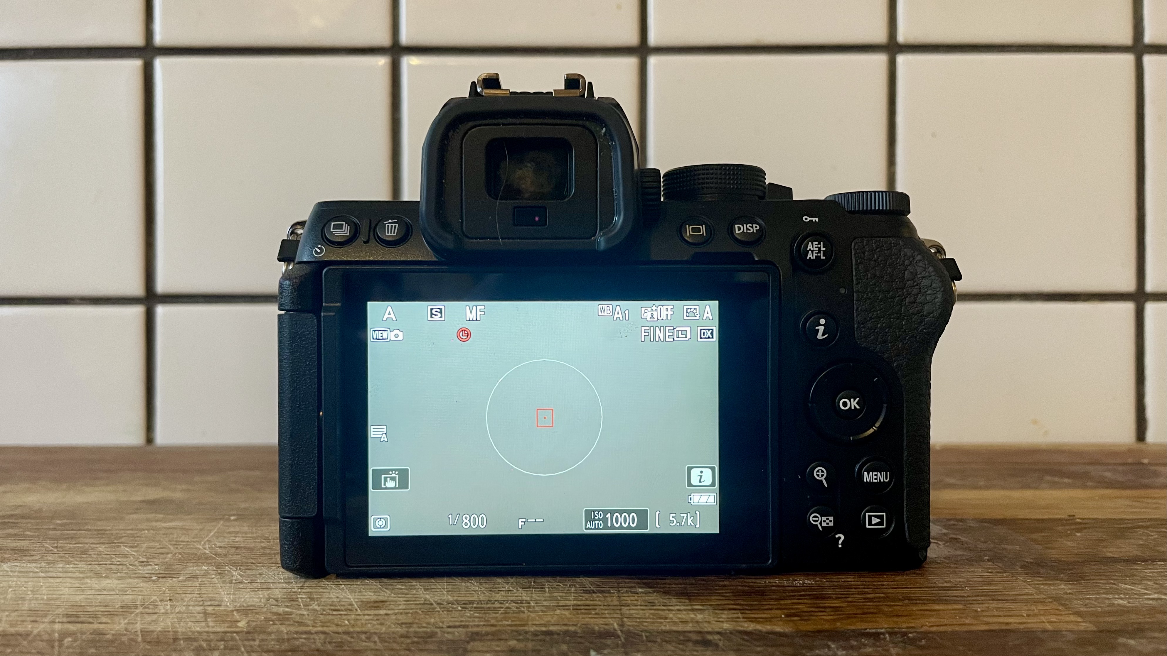 Nikon Z50 II mirrorless camera on a wooden tabletop