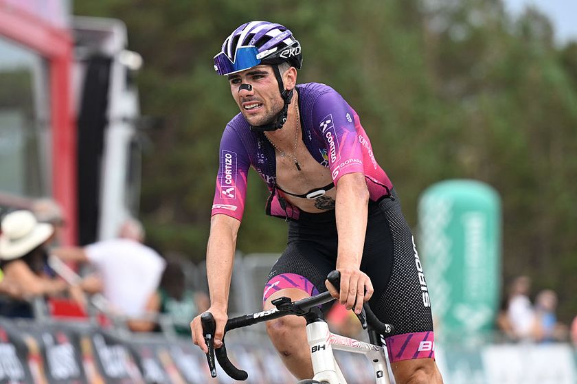 LAGUNAS DE NEILA, SPAIN - AUGUST 09: Mario Aparicio of Spain and Team Burgos Burpellet BH crosses the finish line during the 47th Vuelta a Burgos 2025, Stage 5 a 138.3km stage from Quintana del Pidio to Lagunas de Neila 1866m on August 09, 2025 in Lagunas de Neila, Spain. (Photo by Antonio Baixauli/Getty Images)