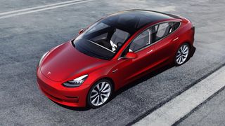View from above of a red Tesla Model 3