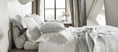 The White Company bedding on a bed