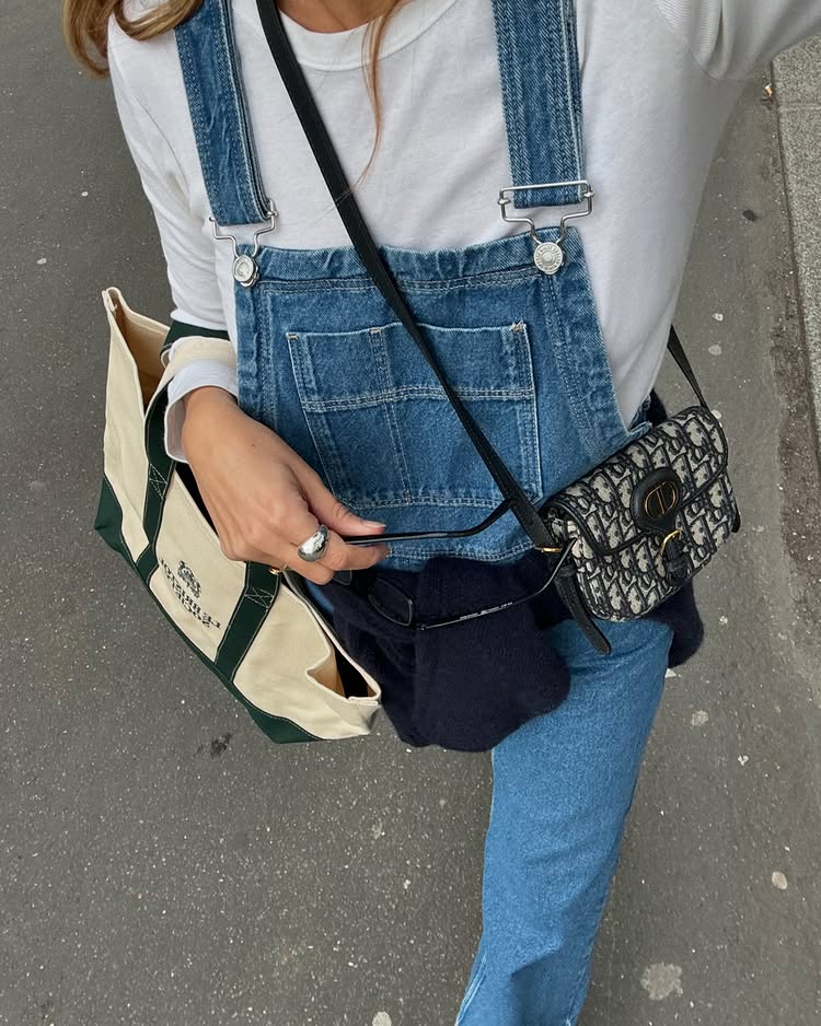 @annelauremais wearing a white long-sleeved top and a denim from Dior Crossbody Bag