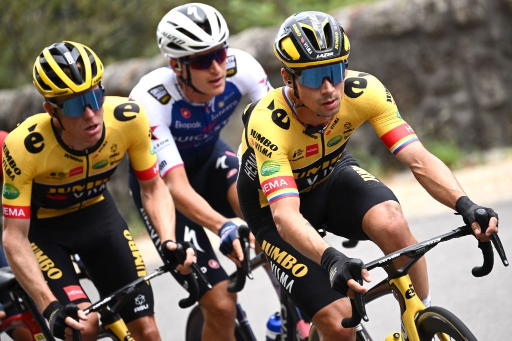 JumboVisma teams Slovenian rider Primoz Roglic R rides during the first stage of the 74th edition of the Criterium du Dauphine cycling race 192 km between La VoultesurRhone and Beauchastel on June 5 2022 Photo by Marco BERTORELLO AFP Photo by MARCO BERTORELLOAFP via Getty Images