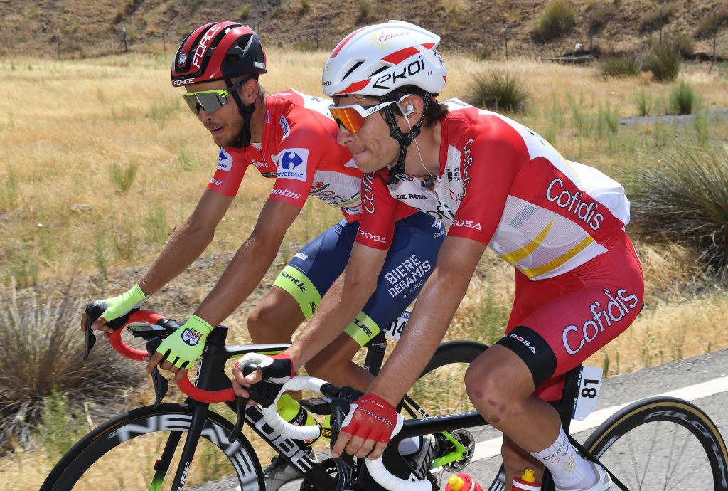 VILLANUEVA DE LA SERENA SPAIN AUGUST 27 LR Odd Christian Eiking of Norway and Team Intermarch Wanty Gobert Matriaux red leader jersey and Guillaume Martin of France and Team Cofidis compete during the 76th Tour of Spain 2021 Stage 13 a 2037km stage from Belmez to Villanueva de la Serena lavuelta LaVuelta21 on August 27 2021 in Villanueva de la Serena Spain Photo by Tim de WaeleGetty Images