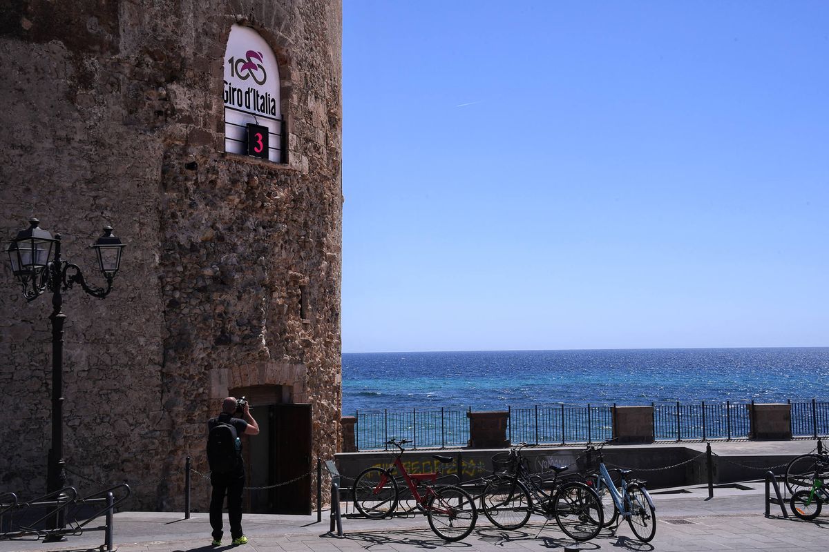 A digital board counting down the days hangs outside a building in Alghero