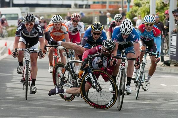 Bernard Sulzberger (V Australia) tangles with Bikebug.com's Philip Grenfell in the sprint to the line on stage eight of the Tour of Tasmania in Burnie.