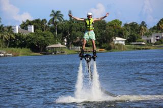 Thrill seeker Barney Walsh tries a spot of hydro flight waterjet boarding on Florida's Lake Ida at Delray Beach