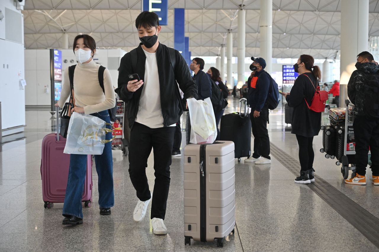 Travelers in Hong Kong