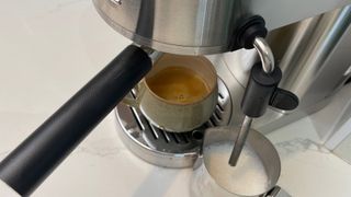 The KitchenAid Artisan Espresso Machine KES6503 ready to steam milk having just been used to brew an espresso