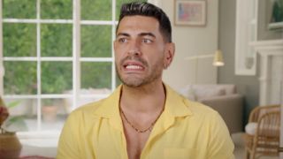 Sarper looking stressed