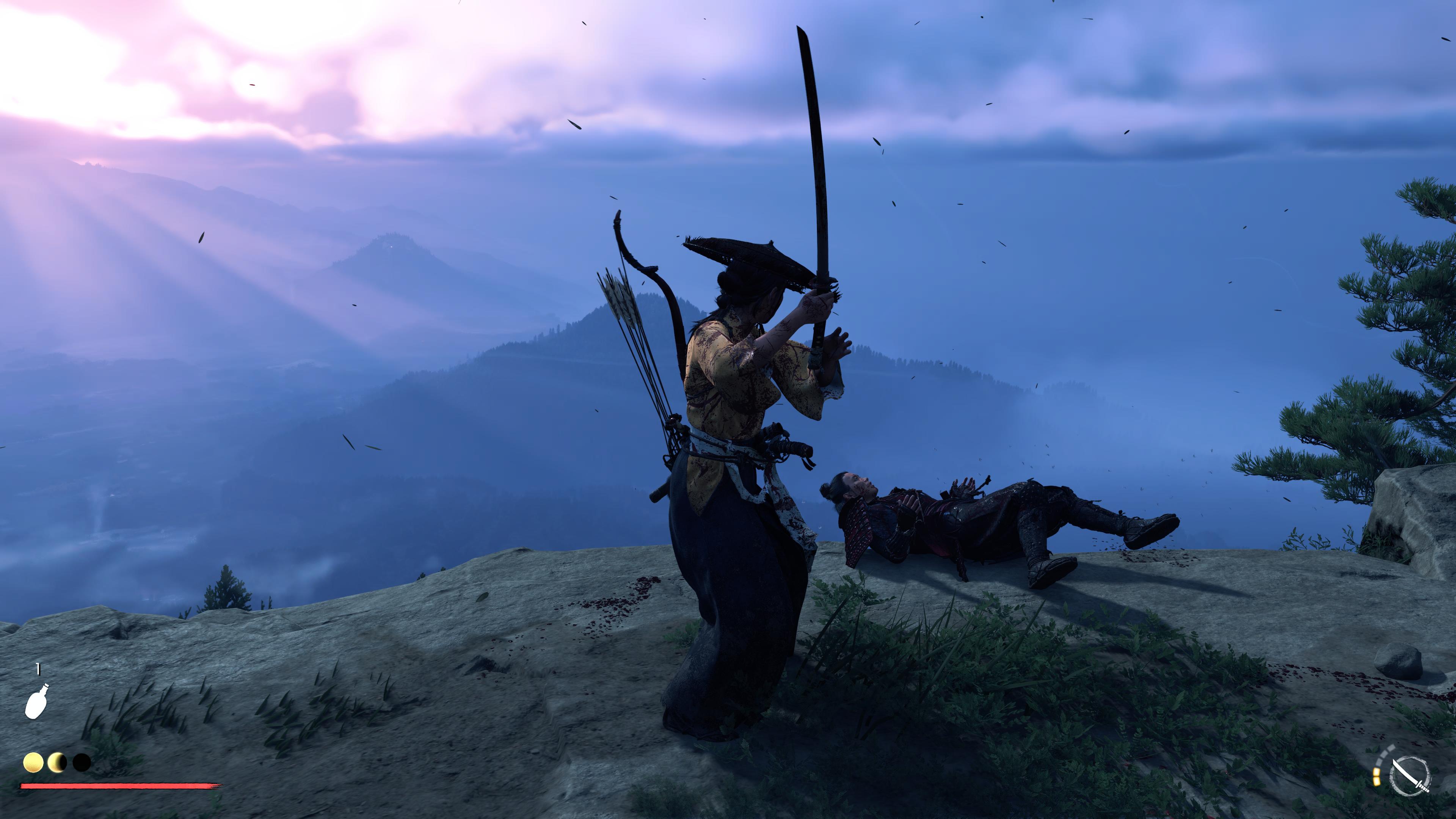 Ghost of Yotei gameplay showing Atsu standing over a defeated foe on a mountaintop, still holding her katana