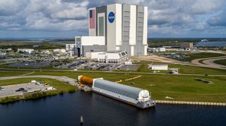 An aerial view of NASA's SLS rocket being offloaded from the Pegasus Barge on April 29, 2021, after arriving at NASA’s Kennedy Space Center in Florida.