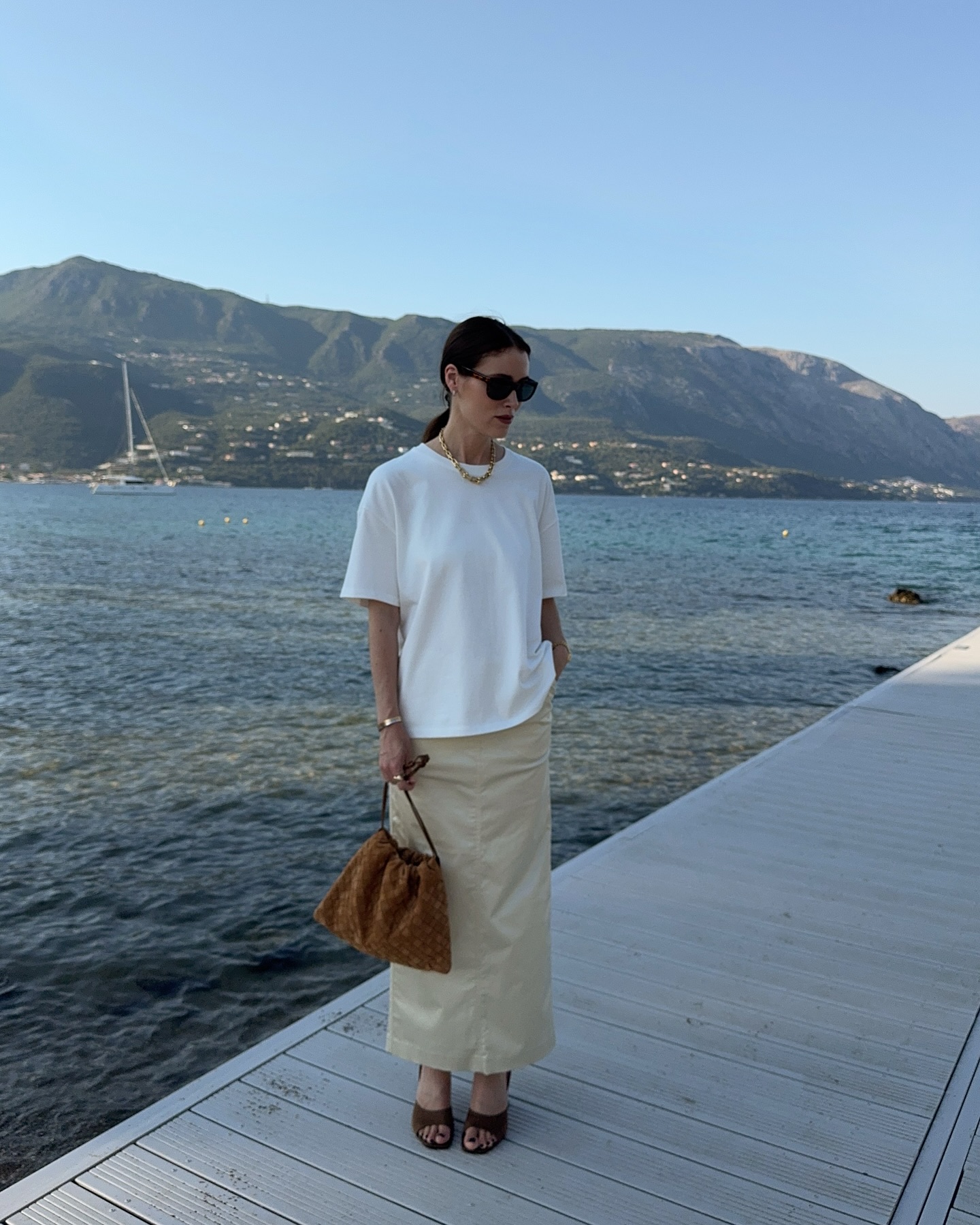 T-shirt and skirt outfits: @annabelrosendahl wears a boxy tee and column skirt