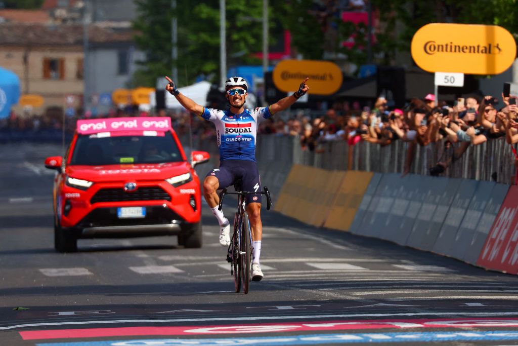 Team Soudal-Quick Step's French rider Julian Alaphilippe celebrates as he crosses the finish line to win the 12th stage of the 107th Giro d'Italia cycling race, 193km between Martinsicuro and Fano, on May 16, 2024. (Photo by Luca Bettini / AFP)