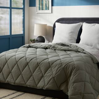 Breeze Comforter on a bed.
