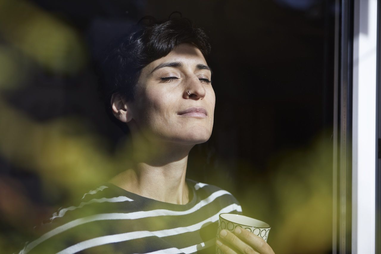 Woman practising breathing exercises for anxiety