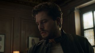 Kit Harington's Dane looking down at the sword in Eternals' credits scene