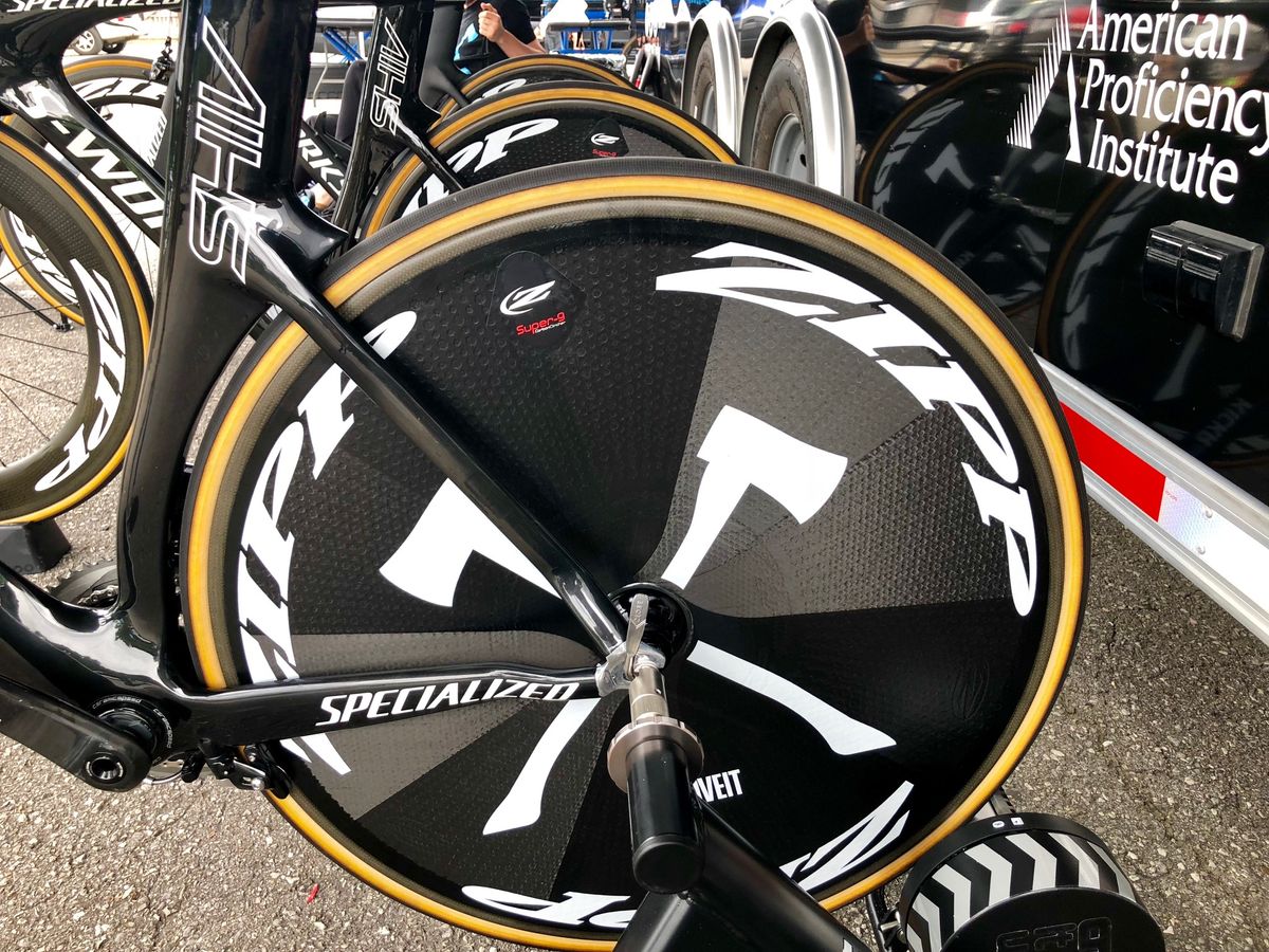 Axeon uses Specialized clinchers on the Zipp discs. Zipp adds the custom sublimated graphics that don't have the ridges to the surface like add-on stickers