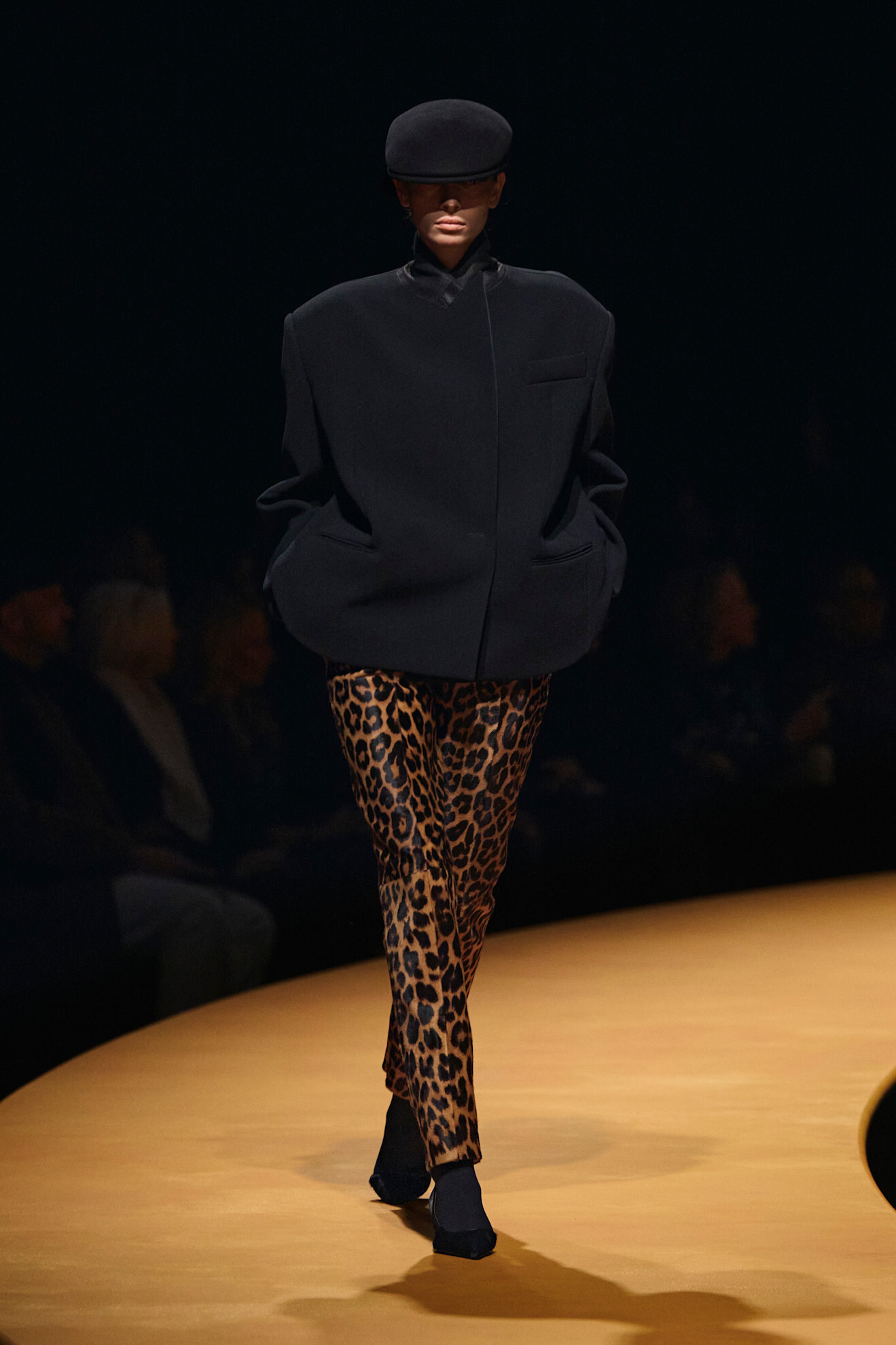 Leopard print pants on the Khaite Fall/Winter 2025 runway.