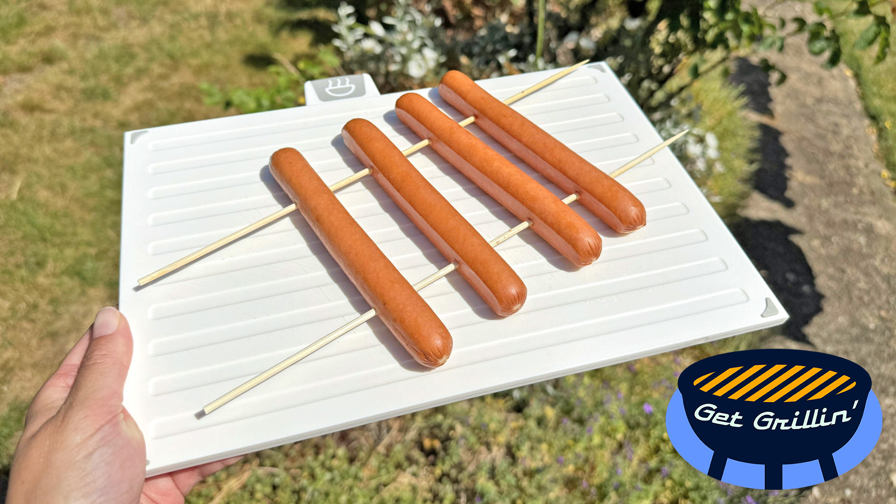 hot dogs on skewers with the Tom's Guide Get Grillin' badge