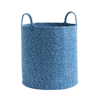 A blue woven storage bag
