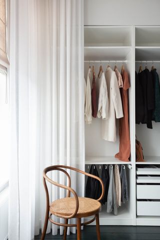 Image of closet with white curtain covering it