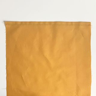 orange colour fabric with square shape