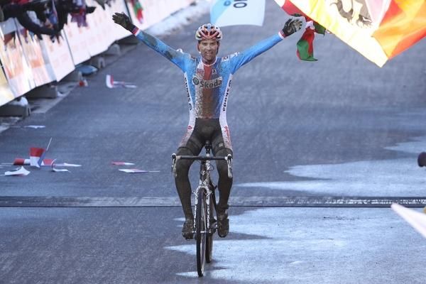 Zdenek Stybar cruises across the line to win the world title.