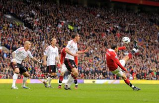 Dimitar Berbatov scores an overhead kick for Manchester United against Liverpool in September 2010.
