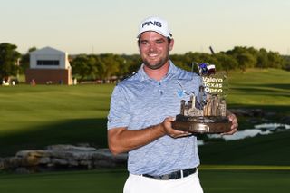 Corey Conners with the 2019 Valero Texas Open trophy