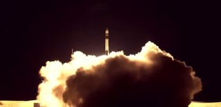 A Rocket Lab Electron booster carrying the StriX-α Earth-imaging satellite for the Japanese company Synspective lifts off from the company's Launch Complex 1 on the Mahia Peninsula in New Zealand on Dec. 15, 2020.