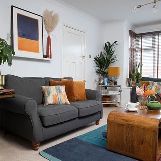 living room with grey sofa