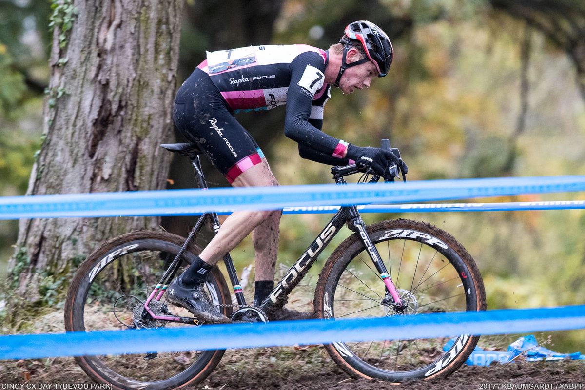 Petrov crests the same muddy slope hunting for traction.