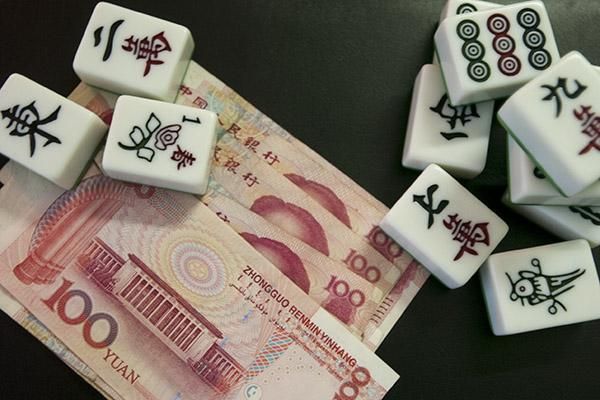 Players will bet big with their Yuan on the popular game of Marjong in China.