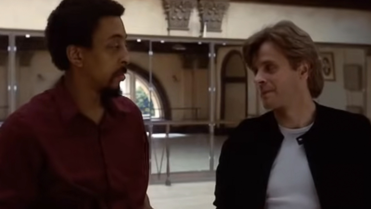 Gregory Hines and Mikhail Baryshnikov talking to each other in White Knights